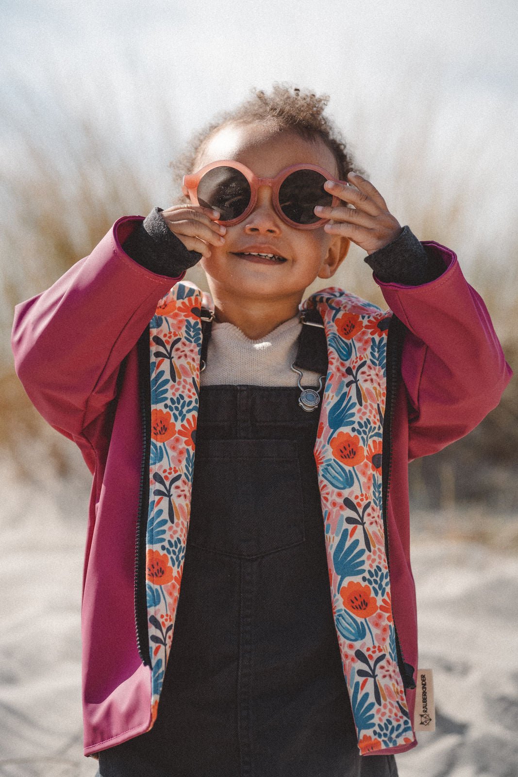Regenjacke Beere / Blumen Bunt - Räuberkinder